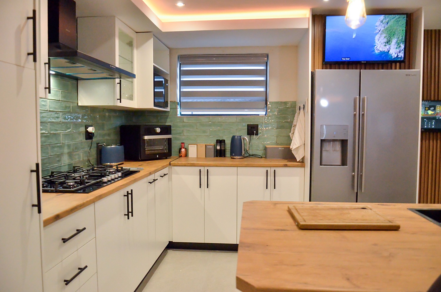 Kitchen corner with the fridge freezer and counter